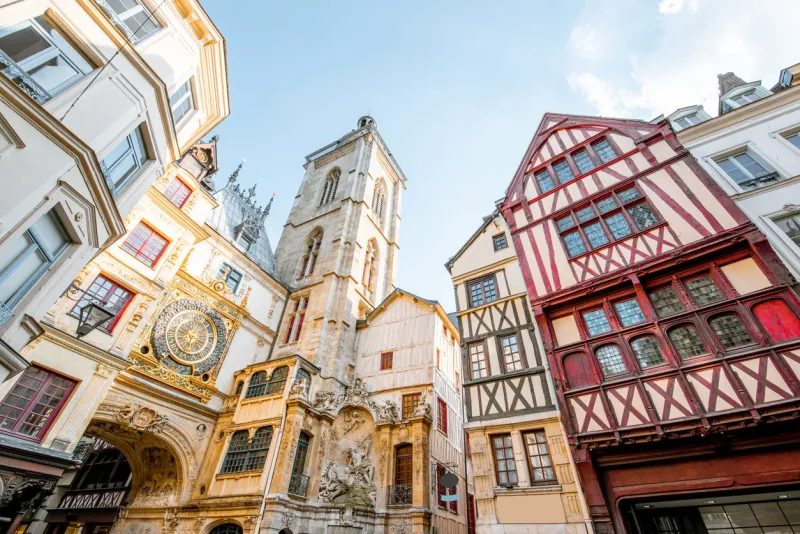 street view with ancient buildings and great clock on renaissance arch, famous astronomical clock in rouen, the capital of normandy region
