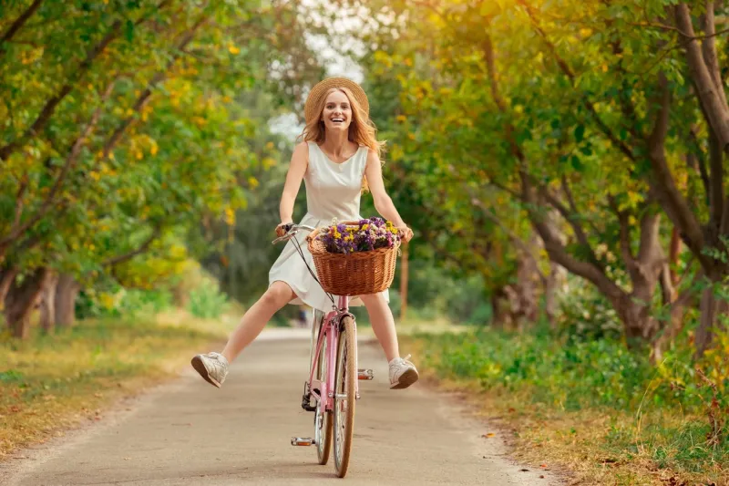young female blonde hair summer style concept bike