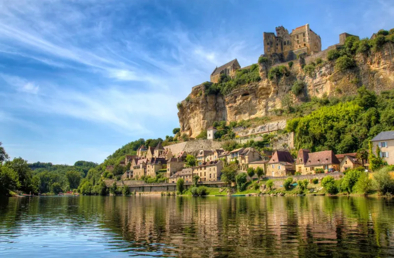 approaching beynac on the river dordogne
