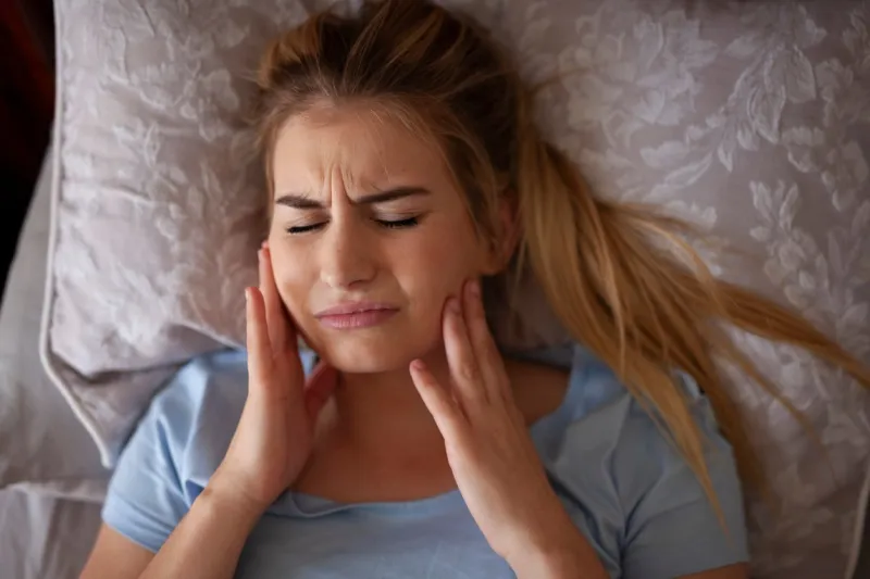 jaw pain after waking up or sleeping, tmj bruxisum, teeth grinding