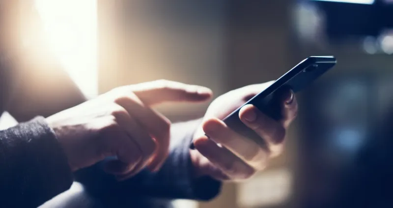 young man with smartphone