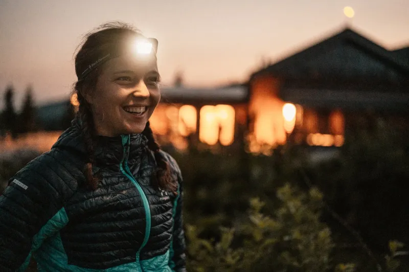 ridge over the slovakia mountains mala fatra hiking in slovakia mountains landscape woman standing under the starry night sky, lighting with head lamp
