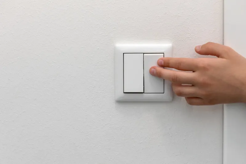 switching off the light, turning off light switch saving concept copy space