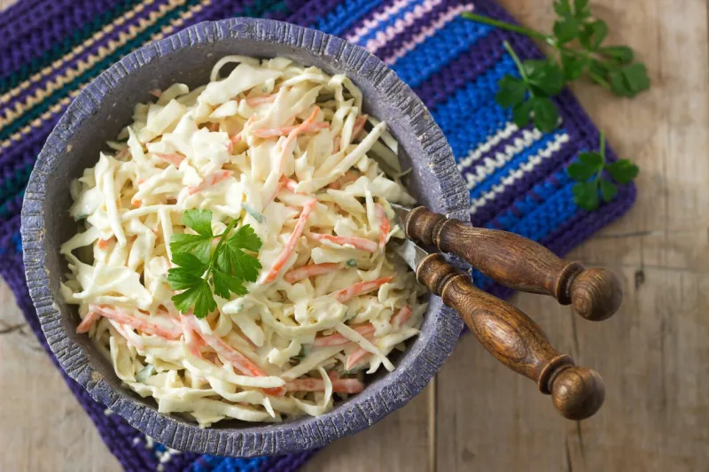 coleslaw salad from cabbage and carrots with dressing mayonnaise selective focus