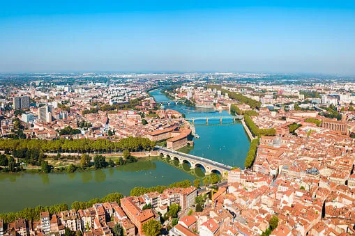 toulouse and garonne river aerial panoramic view toulouse is the capital of haute garonne department and occitanie region in france