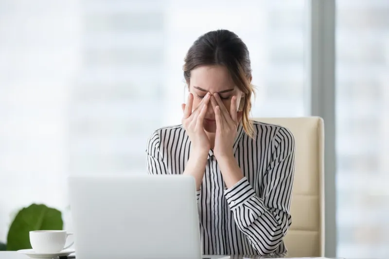 tired businesswoman massaging eyes feeling strain fatigue headache relieving pain, exhausted female worker suffering from migraine eyestrain after computer work, eyesight problem, overwork concept