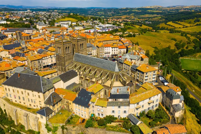 picturesque summer view from drone of walled french town of saint-flour with saint-pierre cathedral, cantal department