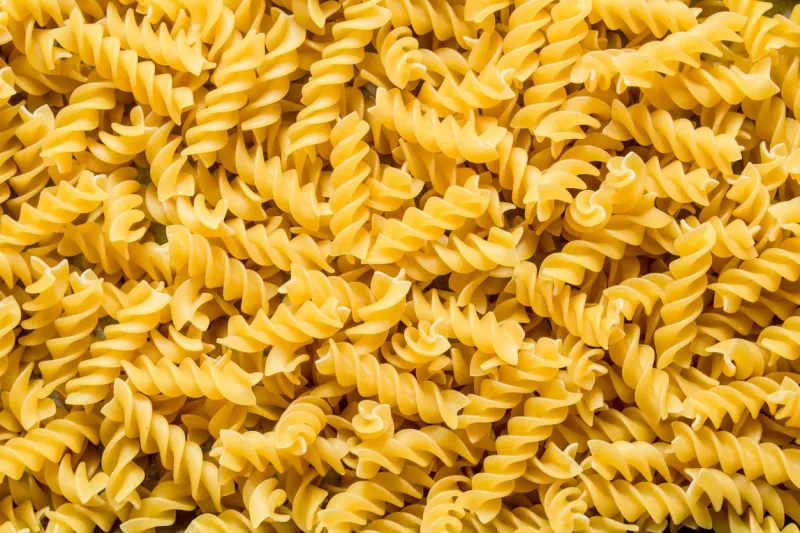pasta background dry pasta fusilli top view