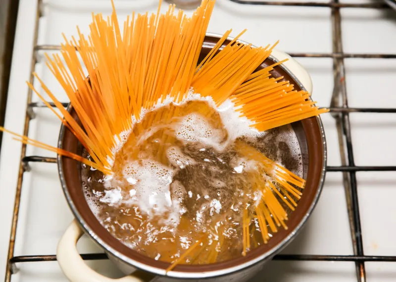 pasta boiling in the pan homemade food on the cooker healthy italian tasty dish