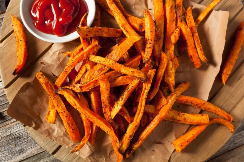 healthy homemade baked sweet potato fries with ketchup