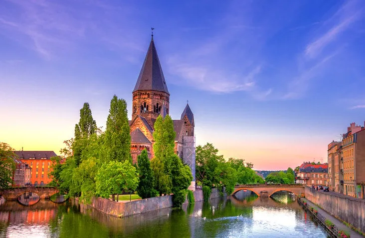 view of metz with temple neuf at the moselle river, lorraine, france