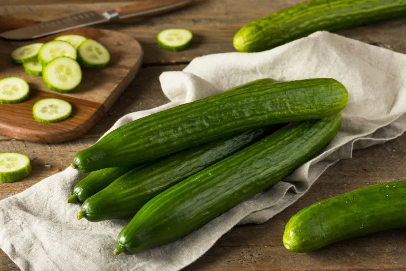 raw green organic european cucumbers ready to eat