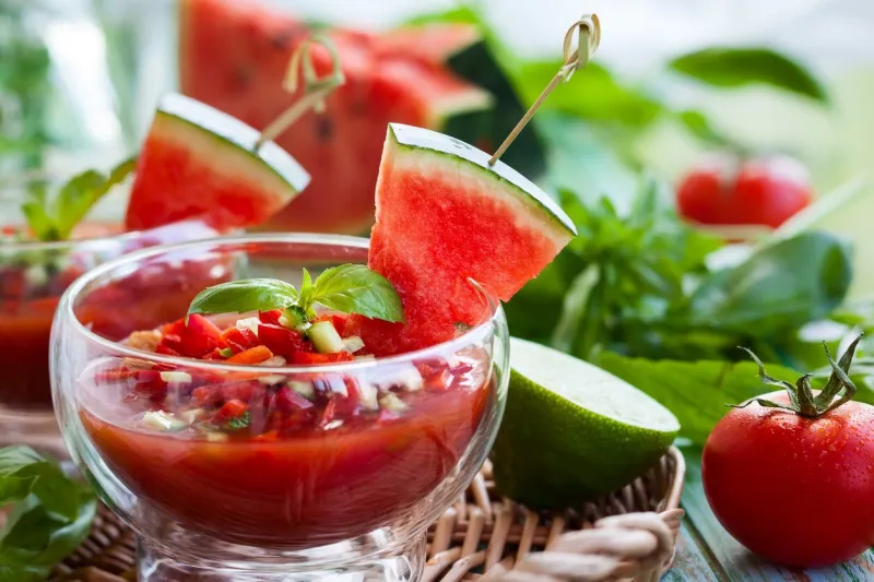 watermelon tomato gazpacho in glass bowls