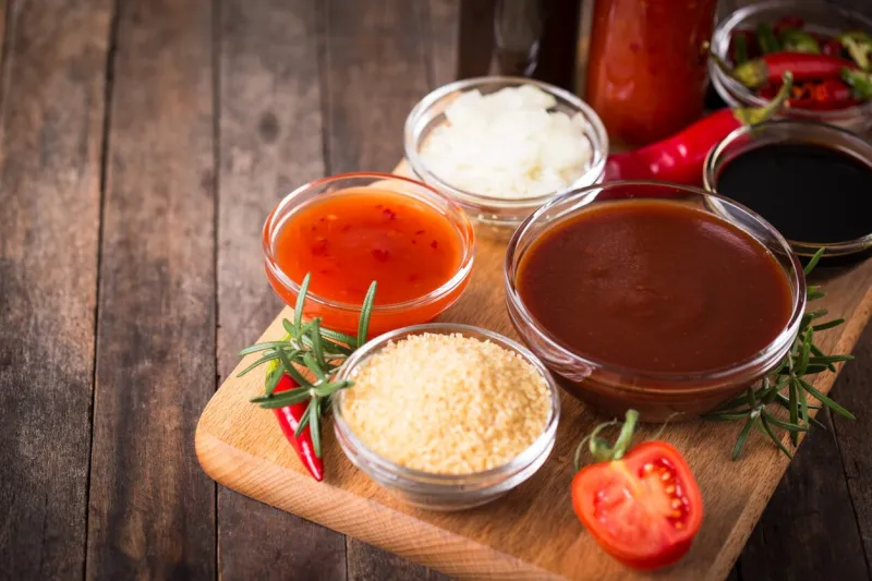 barbeque sauce with ingredients on the table