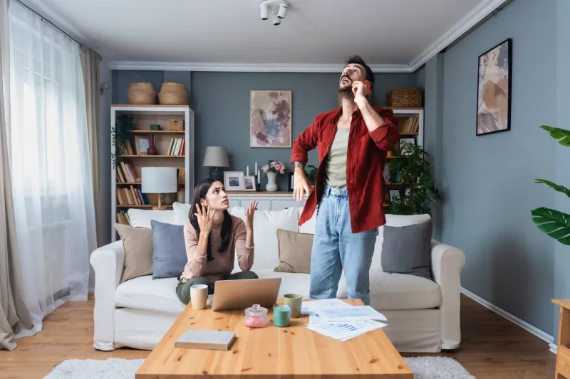 young couple calling police to report domestic violence man and woman call 911 to report loud noise from apartment above, argue and screaming voices neighbors having fight at their home