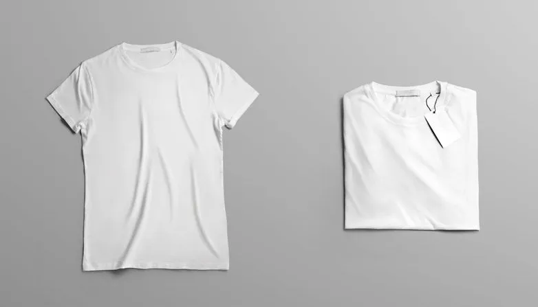 mockup clothes the first open blank t-shirt lies on grey studio background second t-shirt with label neatly folded on a background top view template for fashion design