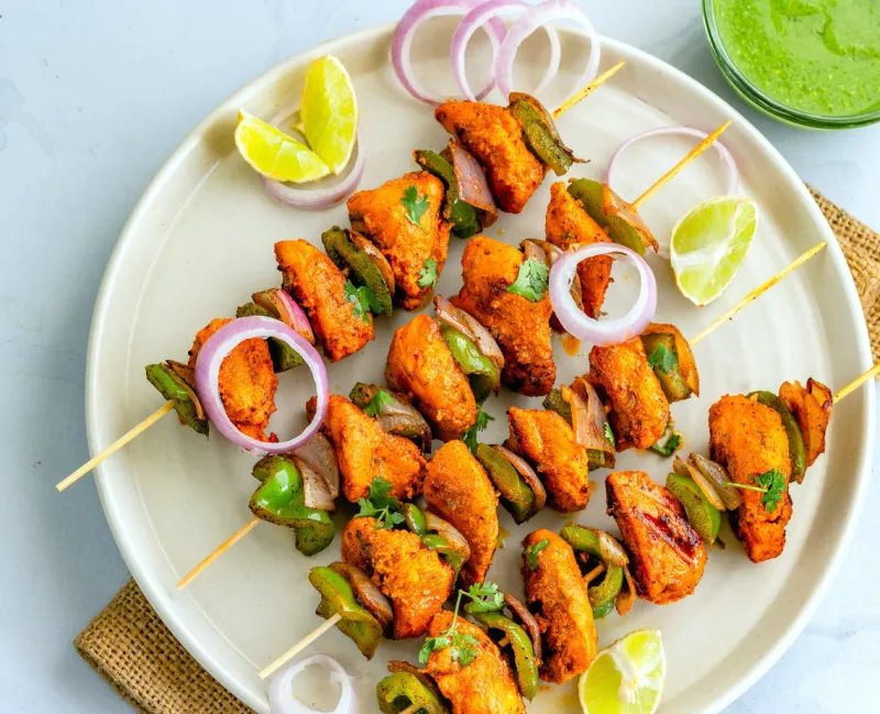 indian chicken tikka on the bamboo skewers popular indian chicken kebab, appetizer and party food