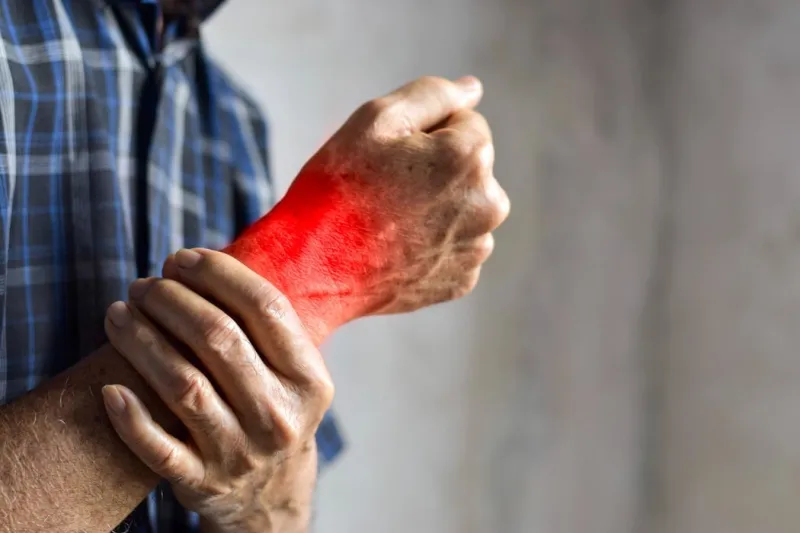 inflammation in the wrist joint of asian old man concept of joint pain or osteoarthritis