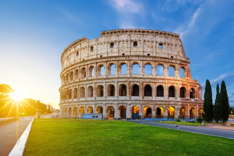 view of colosseum in rome at sunrise, italy, europe