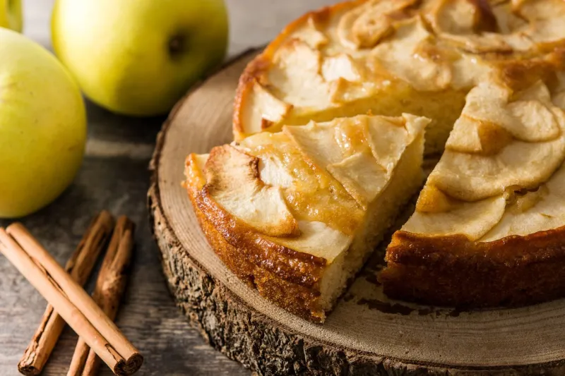 homemade apple pie on wooden table