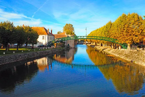 metal footbridge, built according to the gustave eiffel process, above the briare canal, in montargis, in the center-val-de-loire region in the heart of france