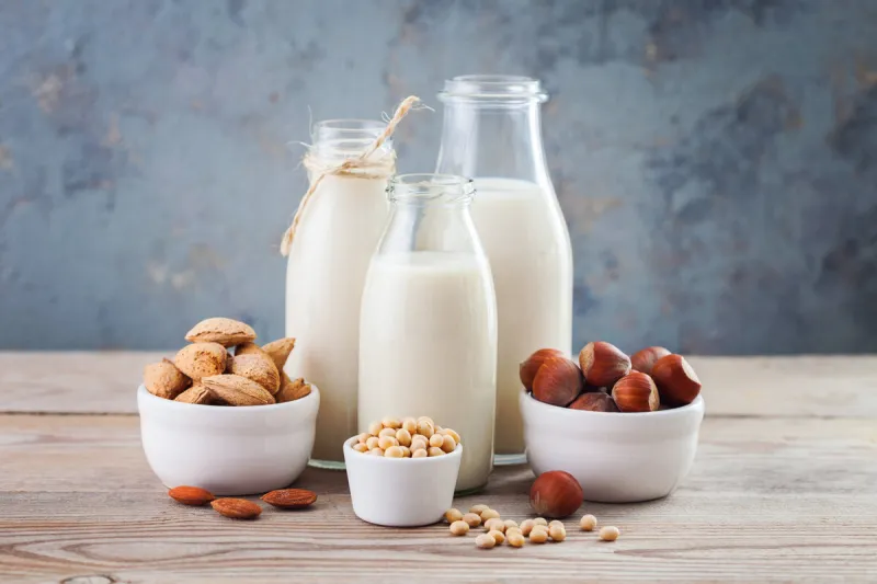 dairy free milk drink and ingredients for breakfast - food and drink