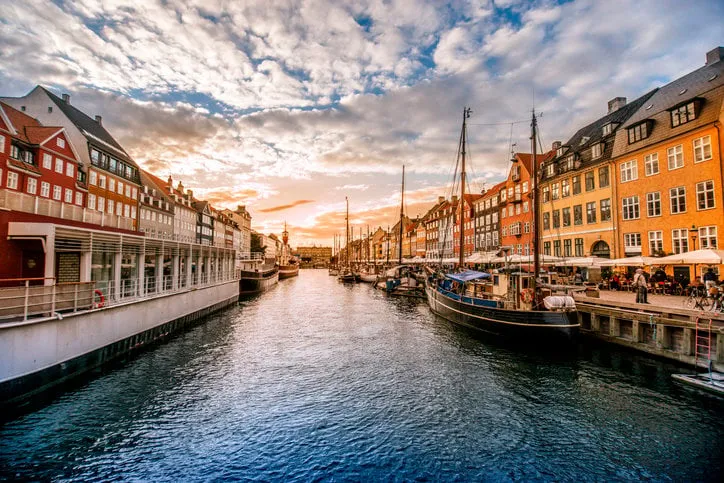 colorful traditional houses in copenhagen old town nyhavn at sunset