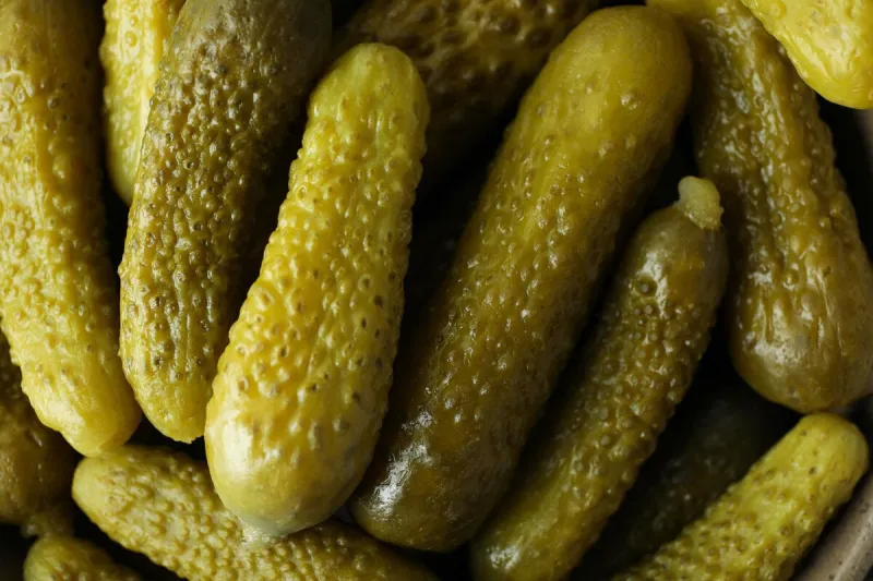 pile of fresh green pickles, close up