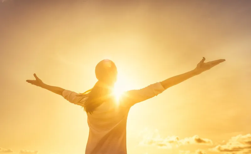 woman feeling full of positive energy