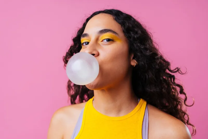 beautiful young hispanic woman with diastema with colorful and cool style - confident and interesting female with diverse and unique style, concepts about fashion, individuality and body acceptance