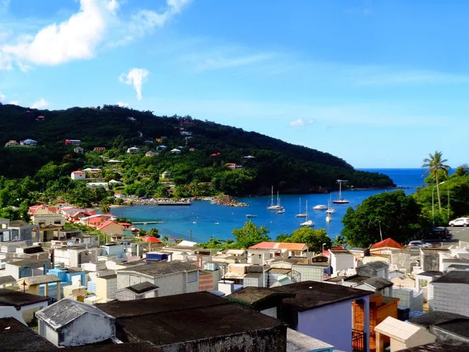 guadeloupe is a french island in the caribbean with magnificent beaches, a tropical forest and a volcanodeshaies is a small town on the northwestern shore of basse-terre, where nice beaches are located