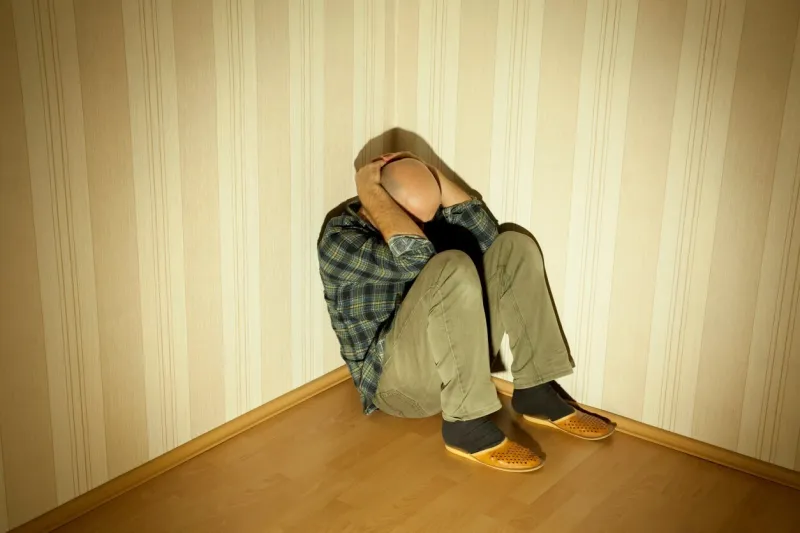 lonely man in angle ill on depression