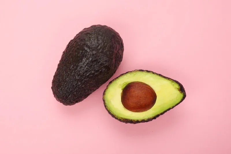 top view of a ripe sliced avocado isolated