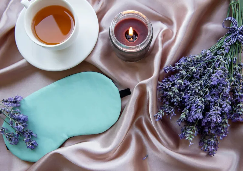 healthy sleep concept lavender bouquet, lavender tea and sleep mask