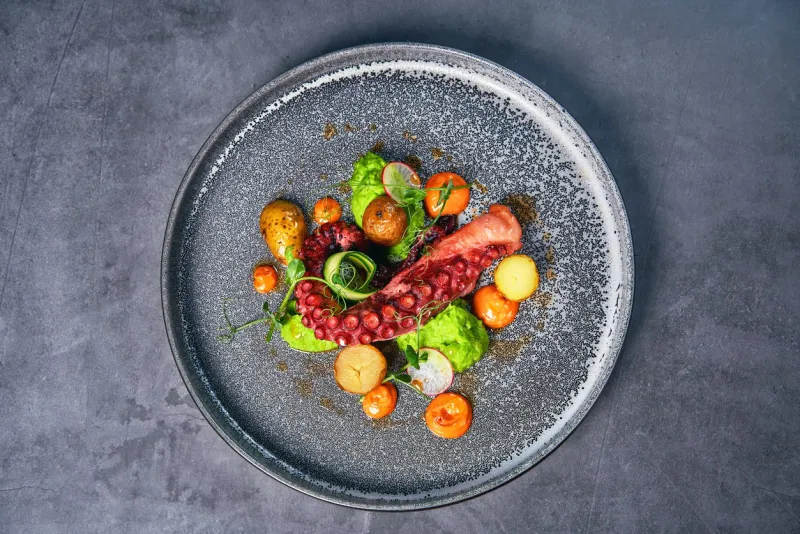 plate with fresh seafood on the table