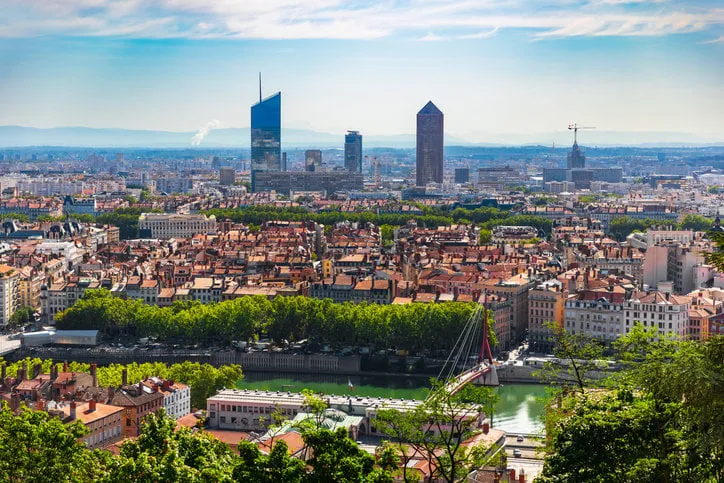 majestic cityscape, high angle view on lyon with the part-dieu business district skyscrapers in background, during a sunny summer day taken in lyon, unesco world heritage site, in rhone department in auvergne-rhone-alpes region, in france (europe)