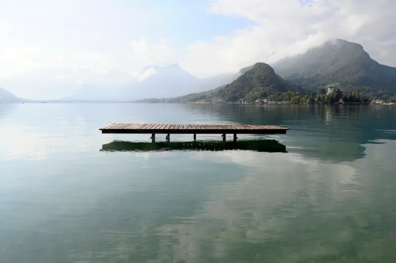 landscape of annecy lake and mountains in savoy, france