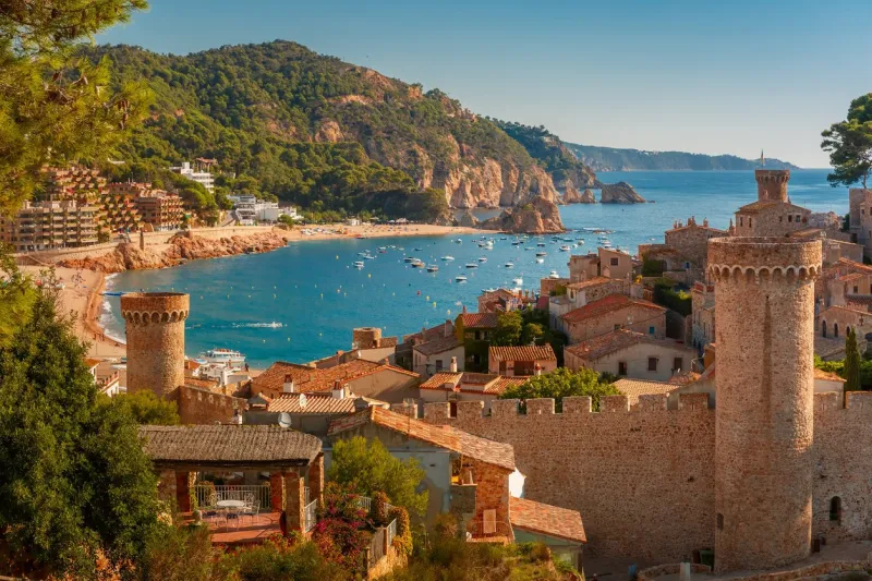 aerial view of fortress vila vella and badia de tossa bay at summer in tossa de mar on costa brava, catalunya, spain