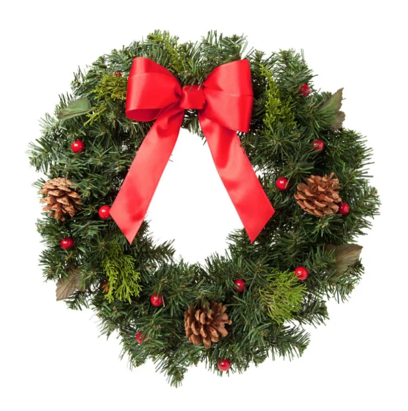 holiday wreath with pine cones and red ribbon isolated on white background