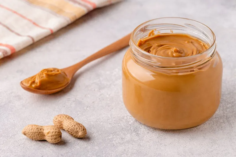 peanut paste in an open jar