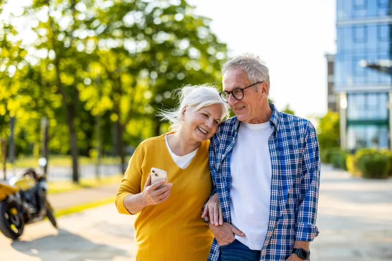 senior couple in love walking in the city