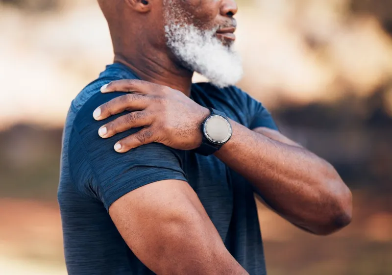 senior hands, shoulder pain or injury in nature after accident, workout or training sports, health or elderly black man with fibromyalgia, inflammation and tendinitis, arthritis and painful arm