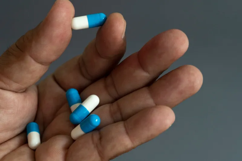 hand and medicine antiretroviral drug concept