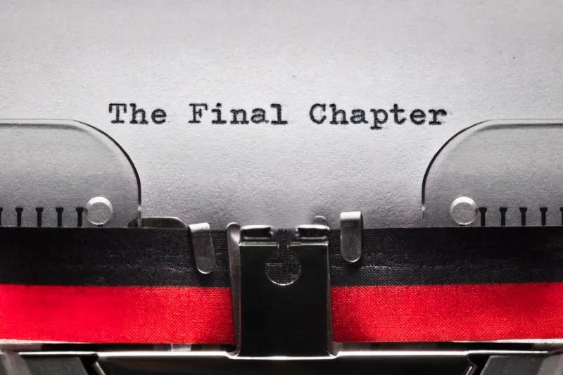 the final chapter written on an old typewriter concelt for end, conclusion, completion and finish line