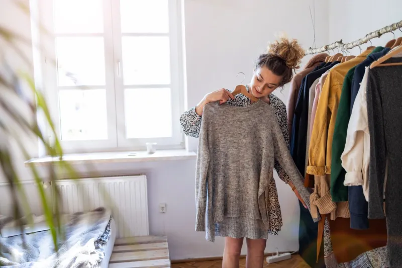 young woman shopping at a clothing boutique
