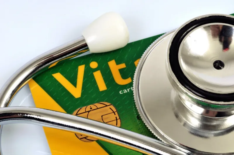 stethoscope placed on a vital card