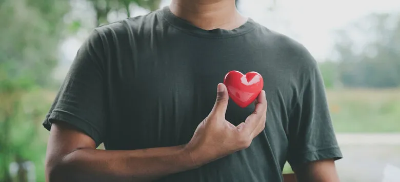 hand holding red heart, world health day, health care and mental health concept, health insurance, charity volunteer donation, csr responsibility, world heart day, self love