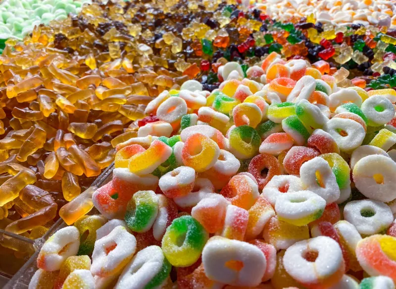 assorted gummy candies and jellies as background a lot of colorful jelly sweets candy flavor top view