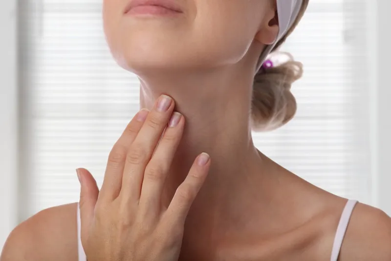woman thyroid gland control