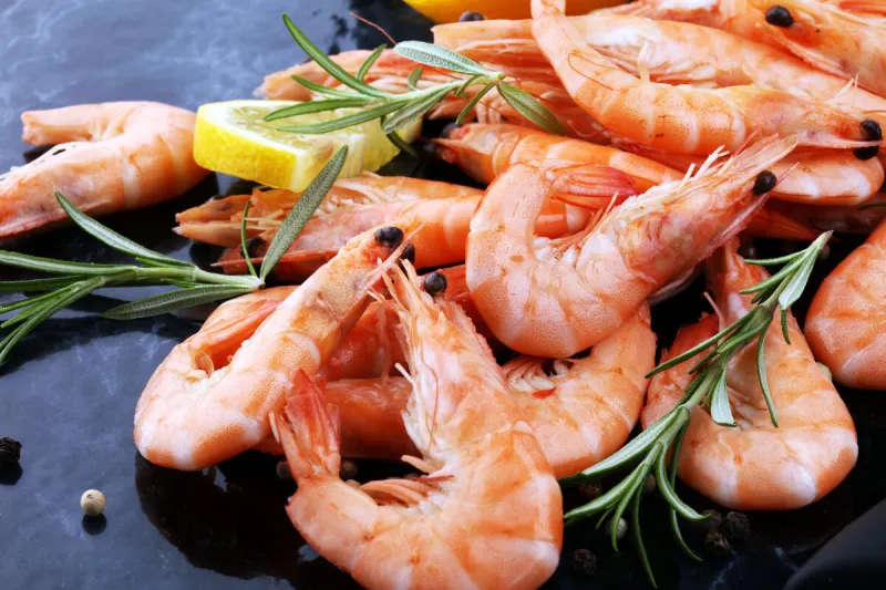 raw fresh prawns langostino austral shrimp seafood with lemon and spices